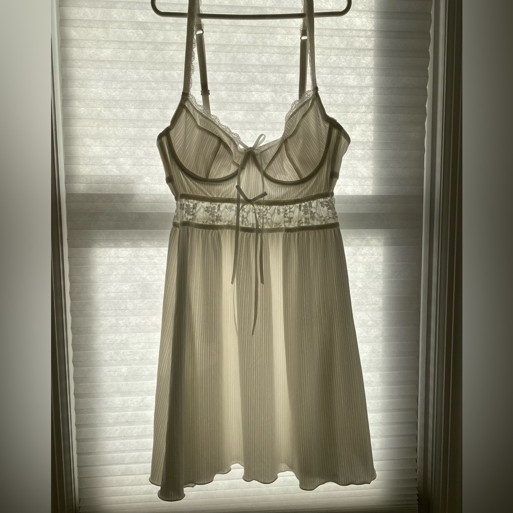 mid length lace teddy with floral accent and underwire bra, size small